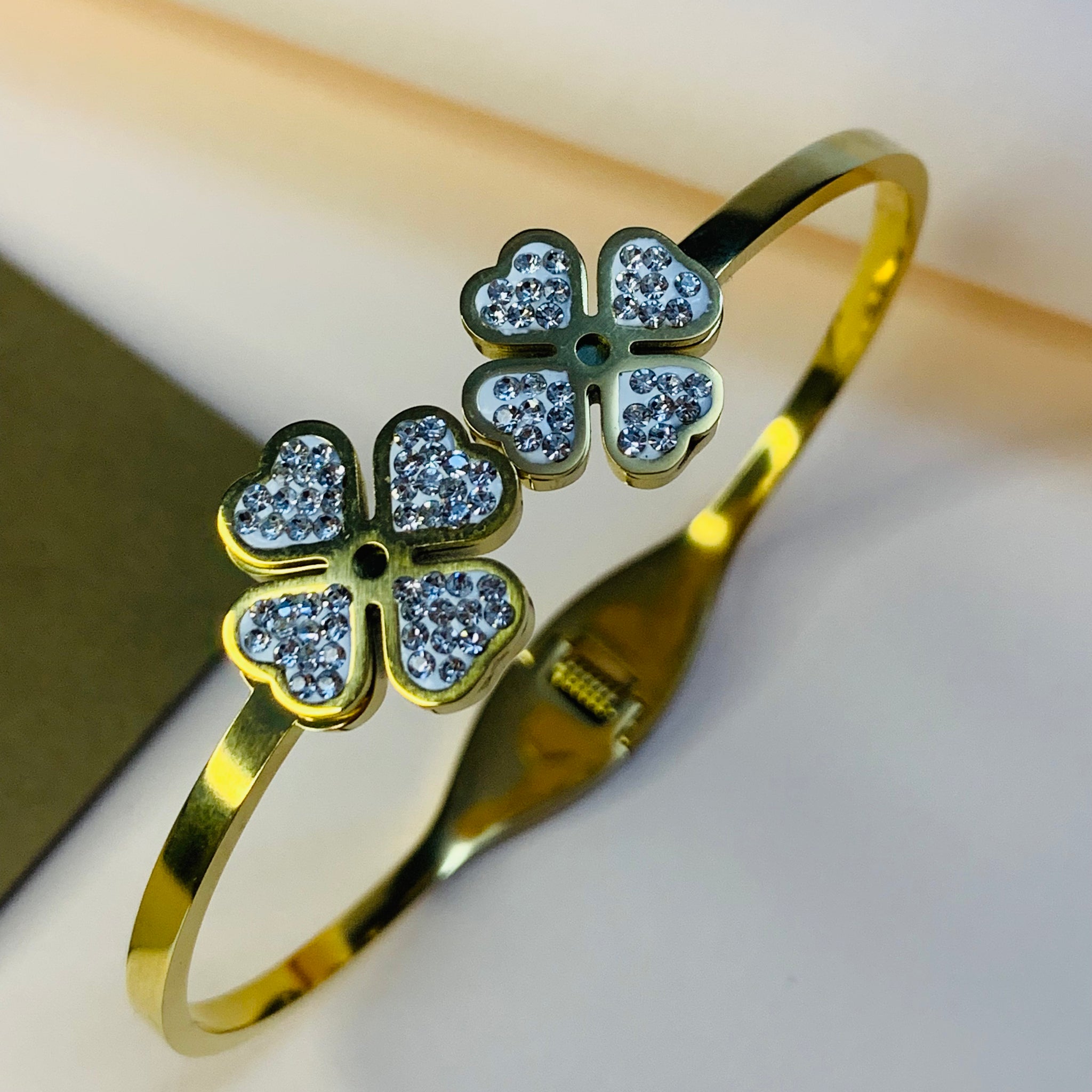 Elegent Floral Bangle in Gold With Crystal Accents